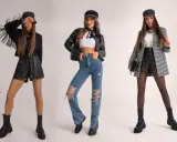 Trzy kobiety prezentują modne stylizacje na koncert: skórzane szorty, podarte jeansy i elegancki żakiet.